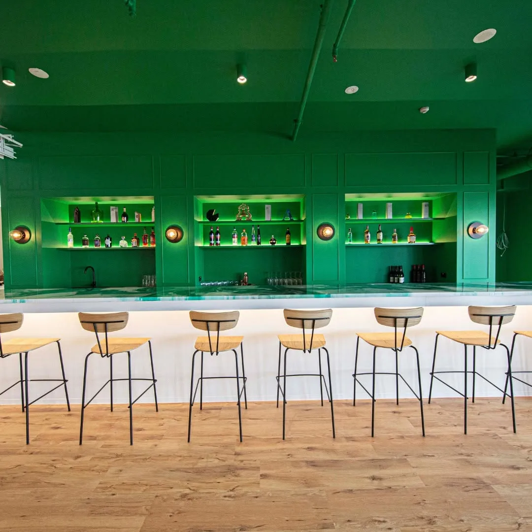 Commercial repaint, hospitality bar with green backbar shelving, Sydney