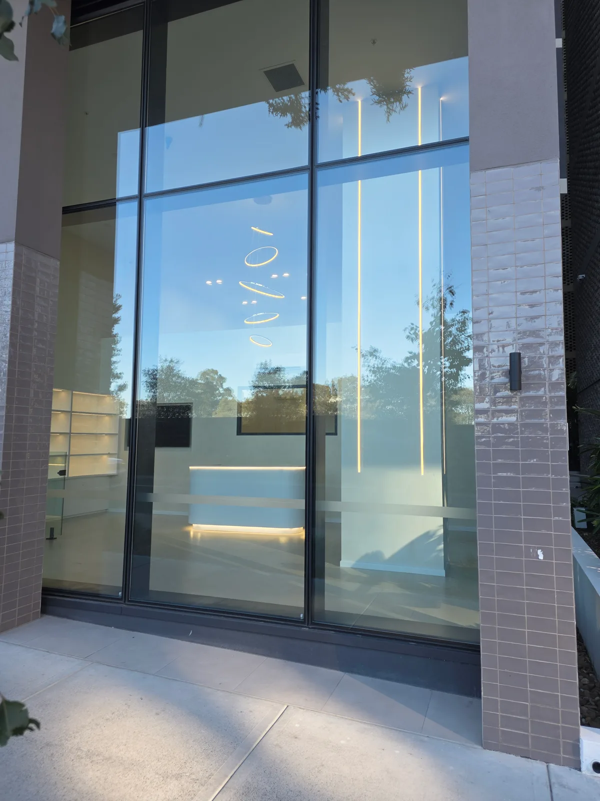 Commercial repaint, pet grooming shopfront glazing and entry, Sydney