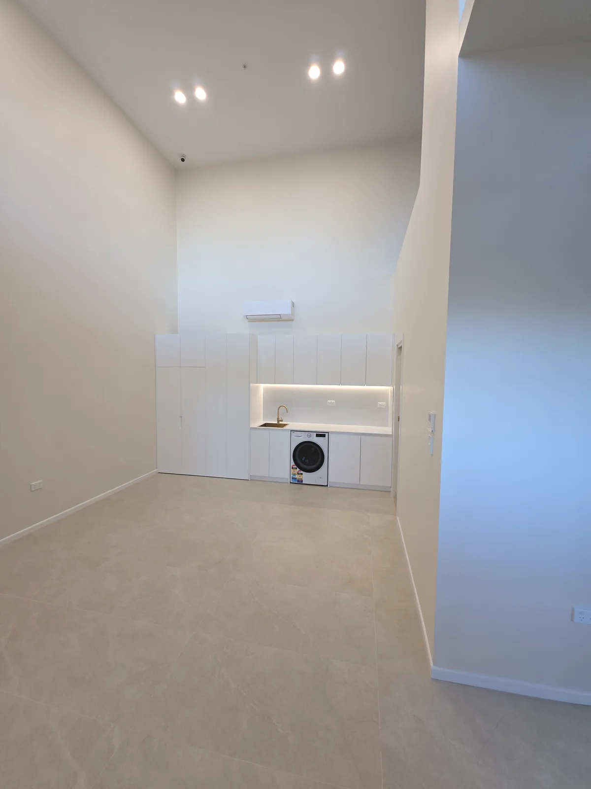 Commercial repaint, pet grooming salon back wash room with sink and machine, Sydney