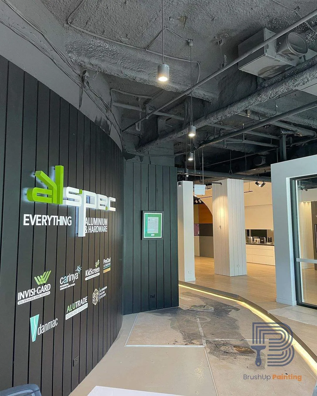 Commercial repaint, retail showroom entry and signage wall, Sydney