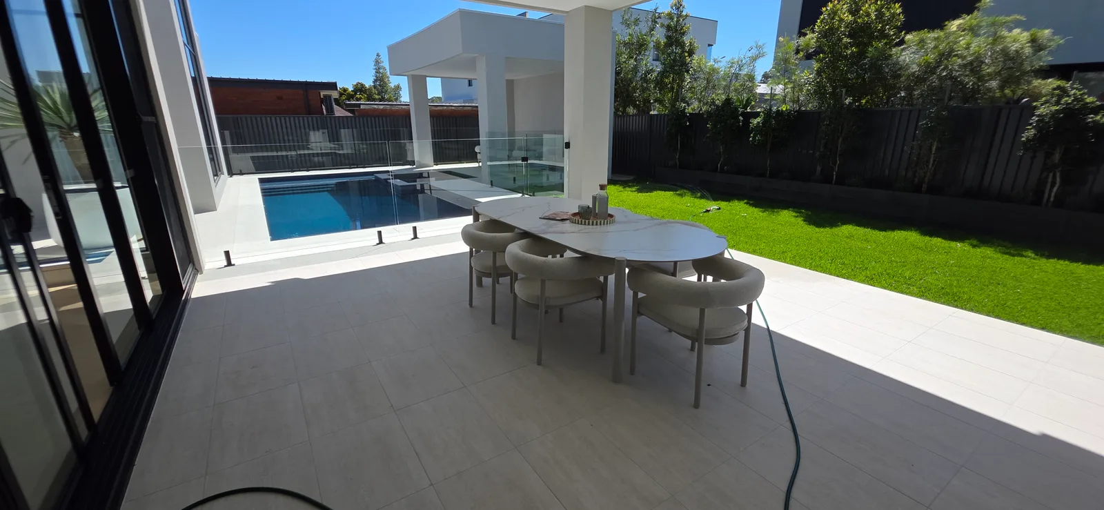 Exterior repaint, alfresco dining terrace beside the pool, Sydney
