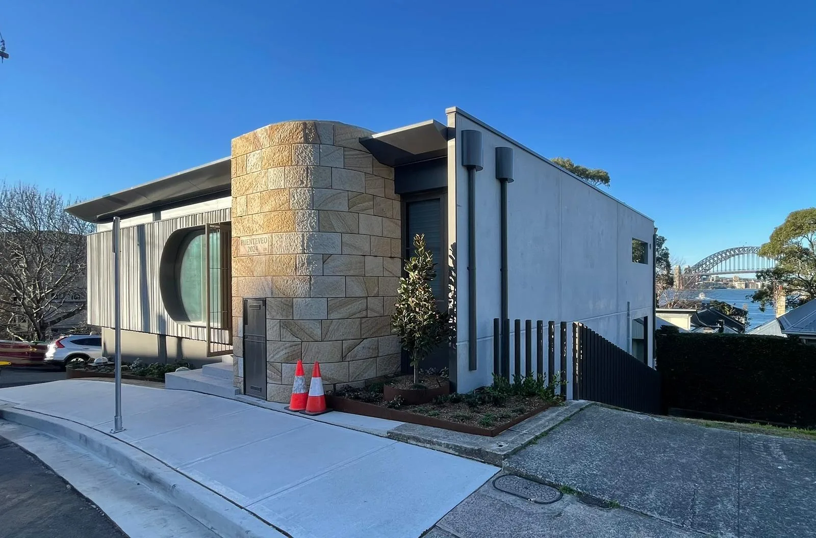 Repainted sandstone corner home with fresh trims, Sydney