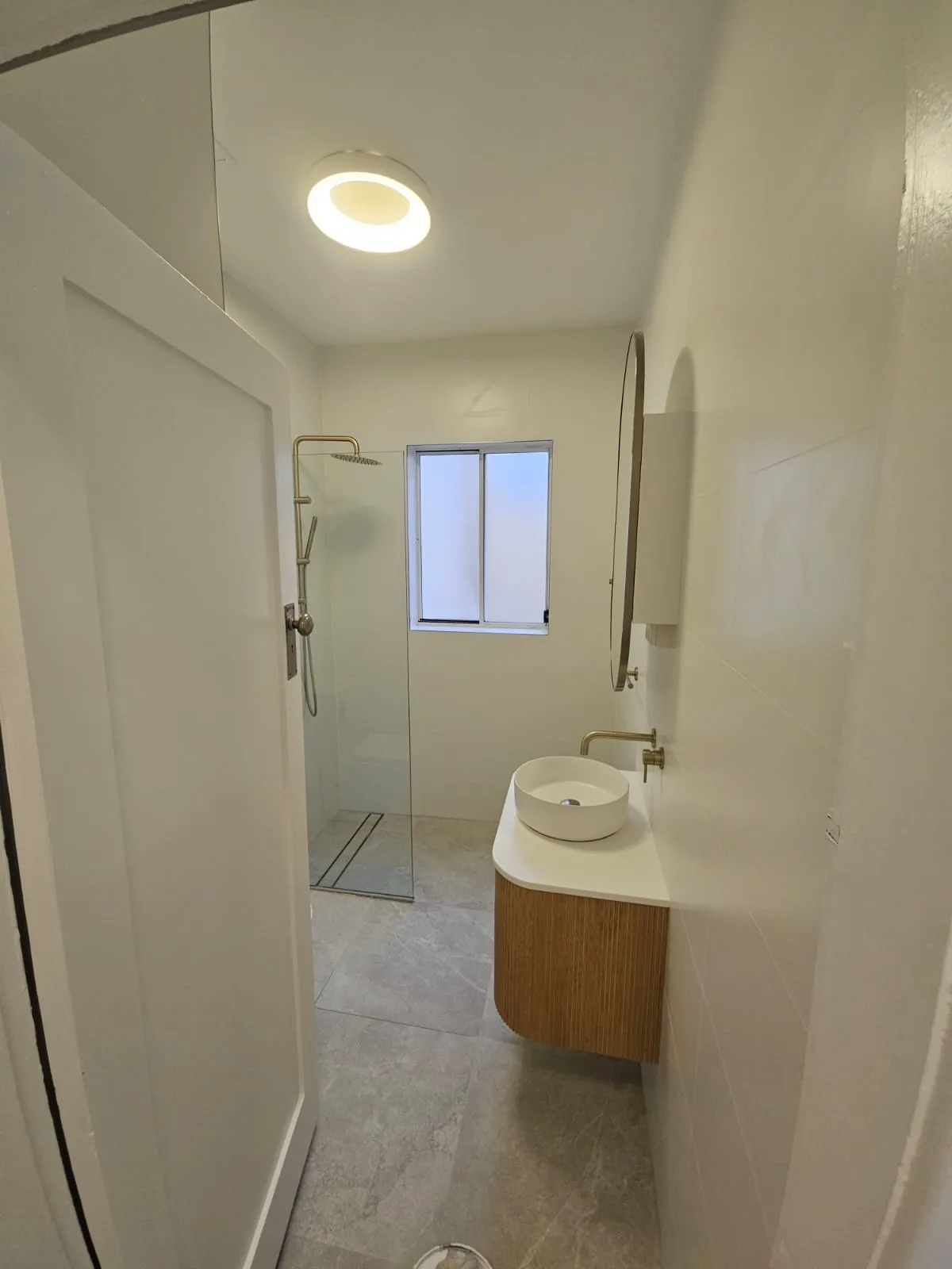 Interior repaint, compact bathroom with gold tapware, Sydney