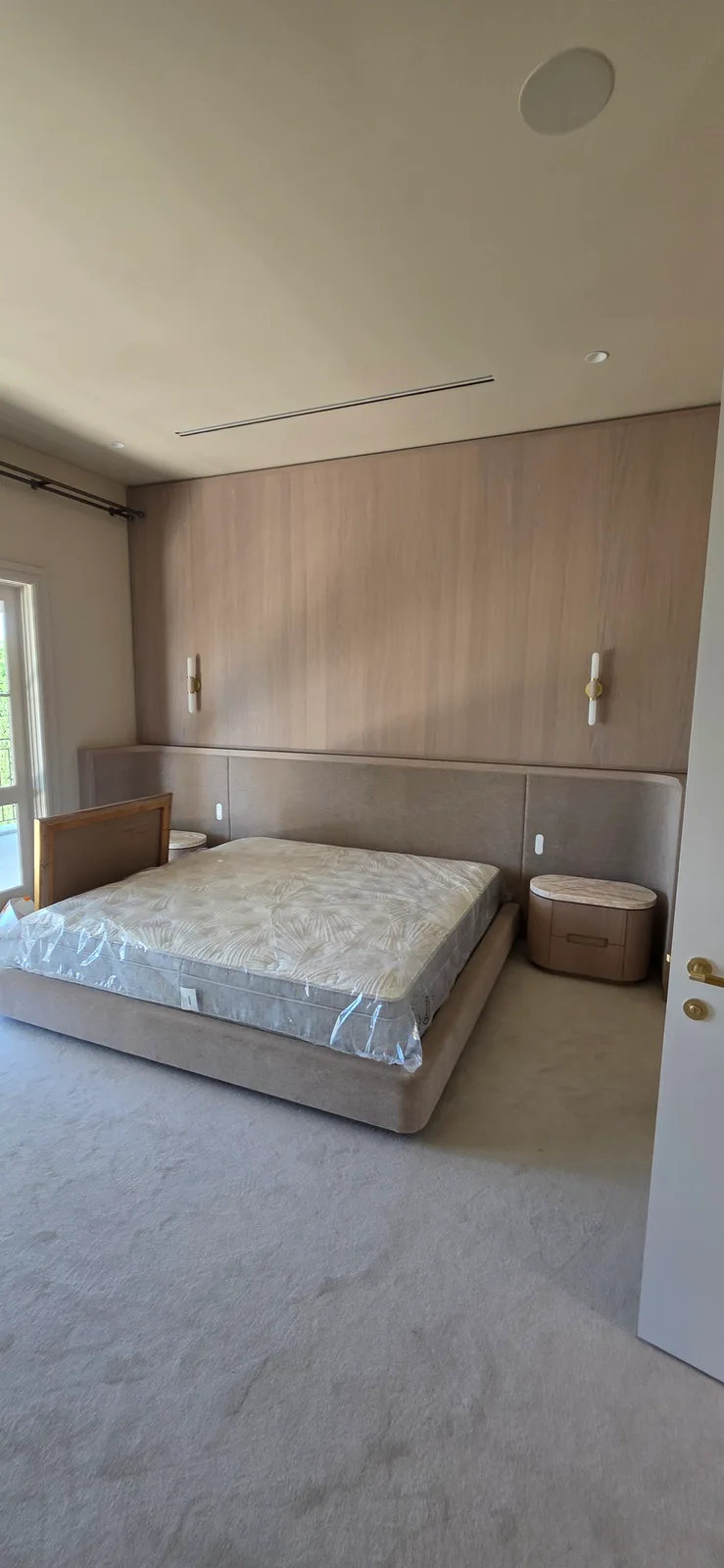Interior repaint, main bedroom with timber panelled bedhead wall, Sydney