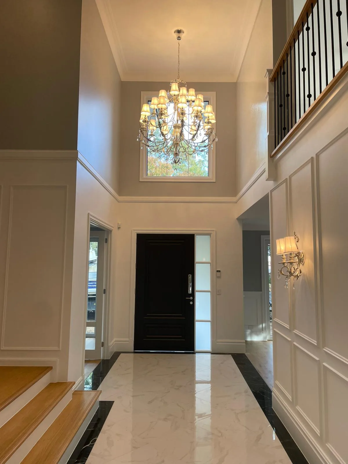 Interior repaint, two storey entry void and chandelier, Sydney