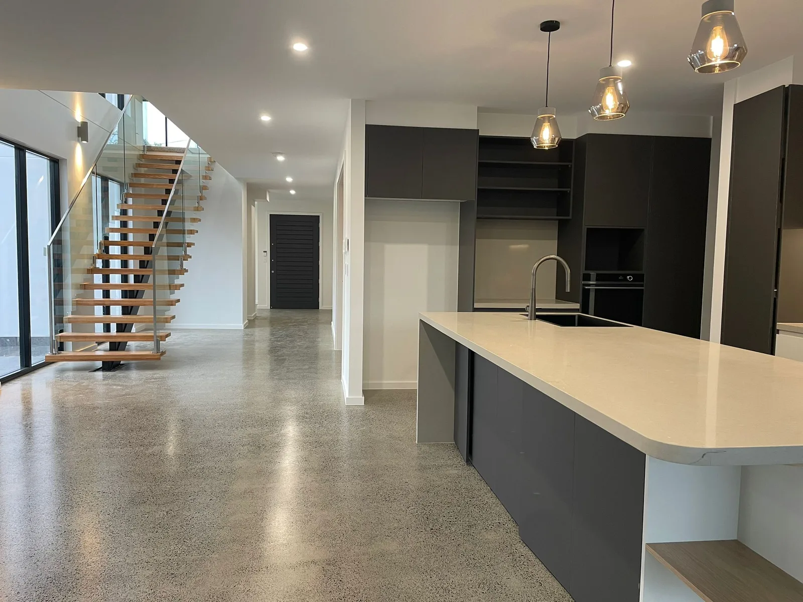 Interior repaint, open plan kitchen and floating stair, Sydney