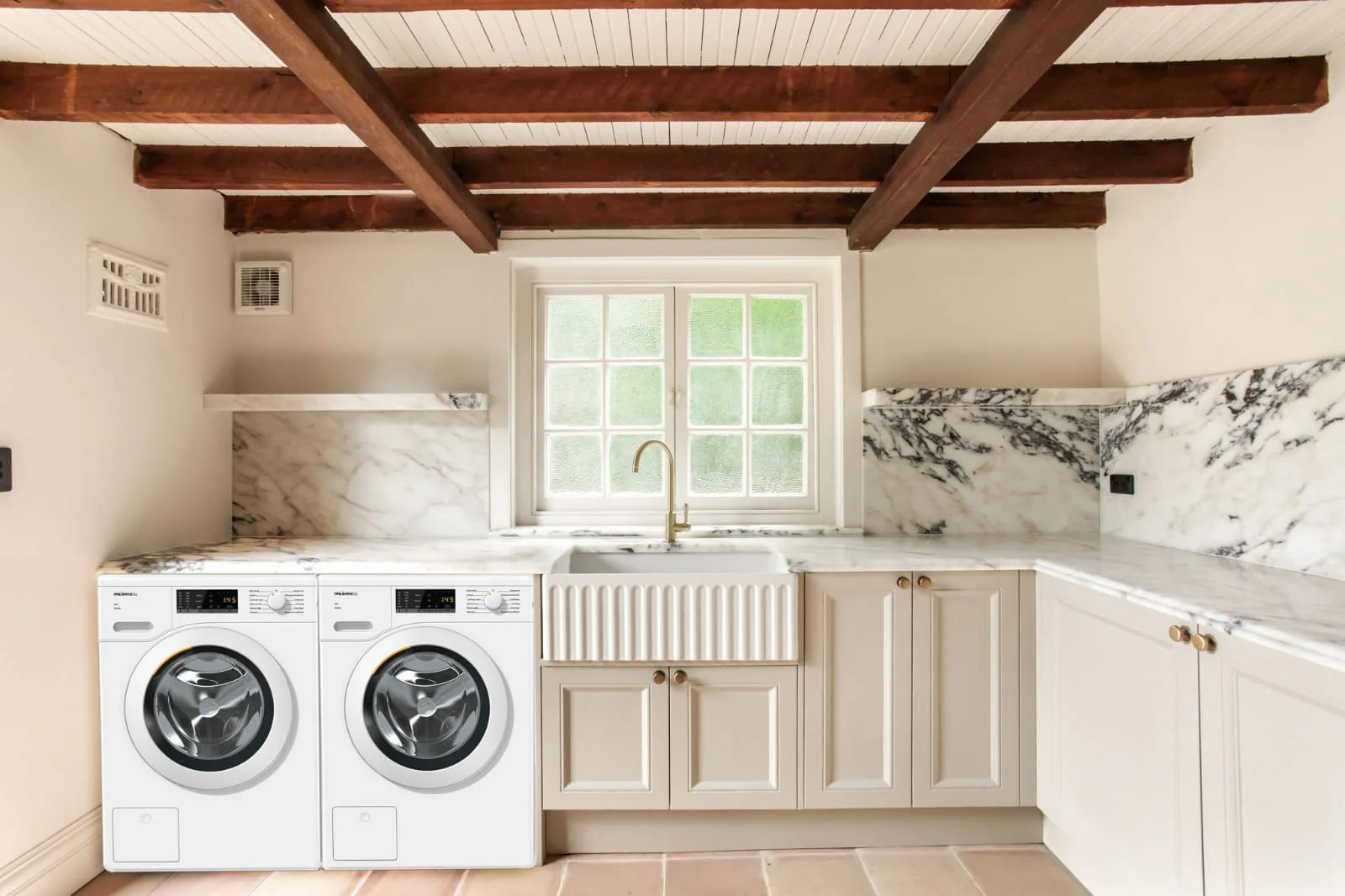 Interior repaint, laundry with exposed beams and marble splashback, Sydney