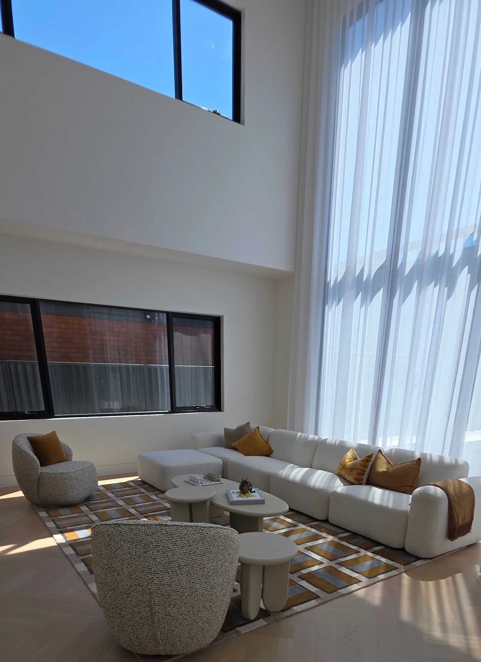 Interior repaint, double height living room and herringbone floor, Sydney