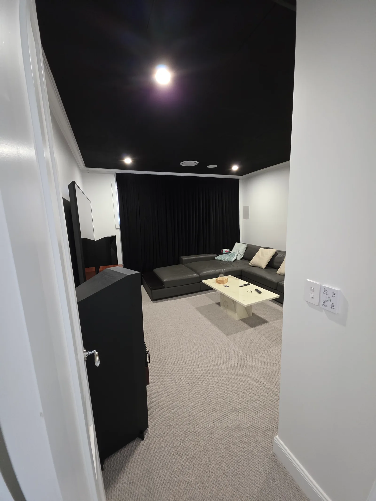 Interior repaint, media room with black ceiling, Sydney
