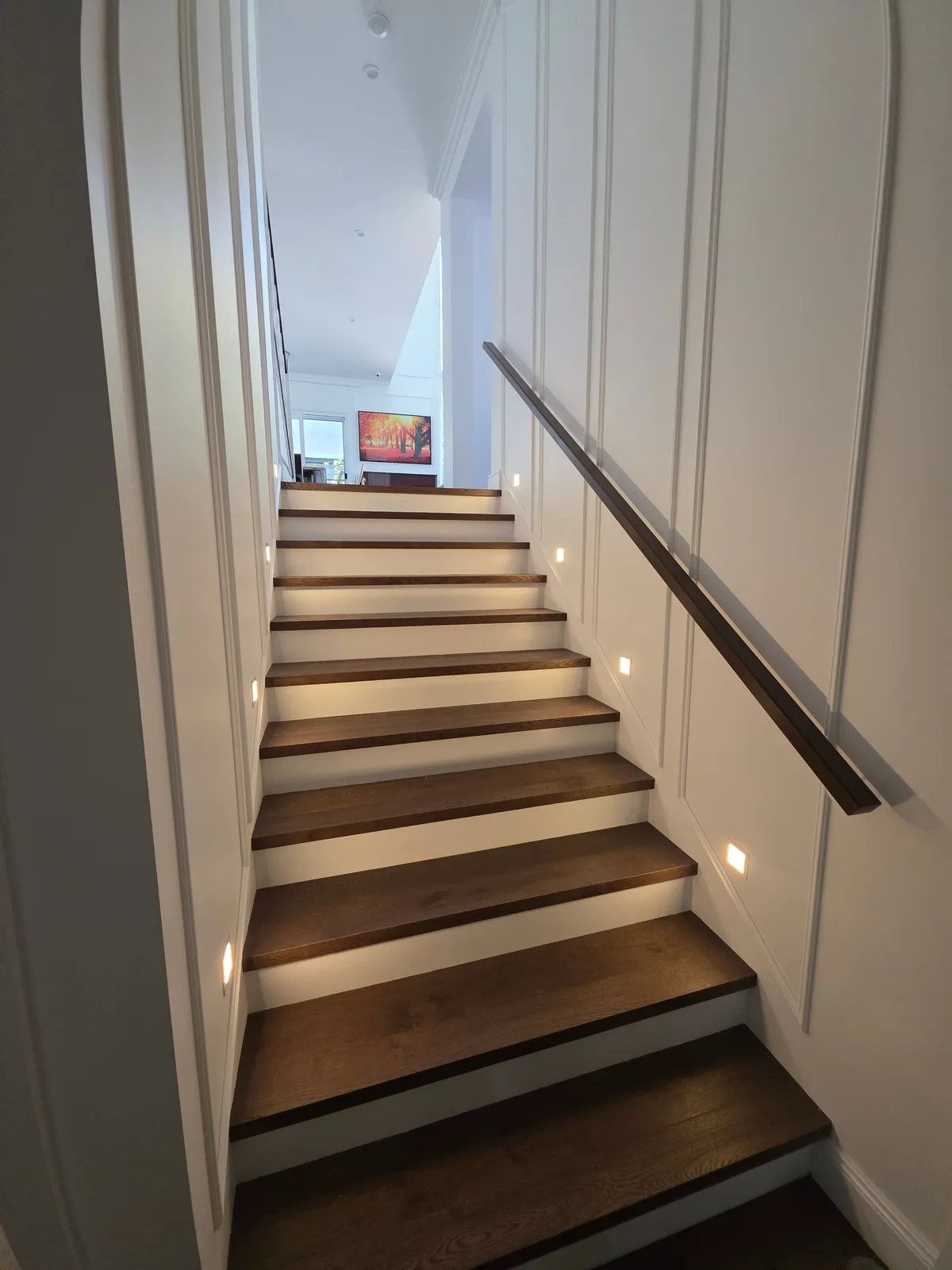 Interior repaint, panelled stairwell with recessed step lights, Sydney
